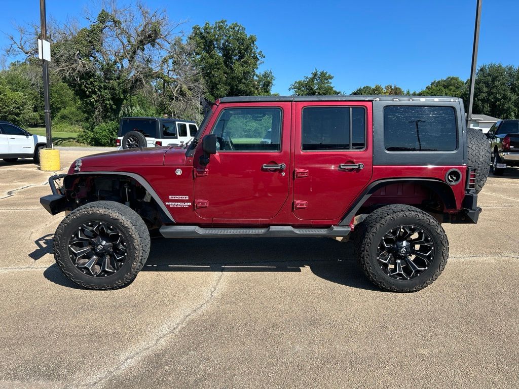 Used 2012 Jeep Wrangler Unlimited Sport with VIN 1C4BJWDG9CL260416 for sale in Bristow, OK