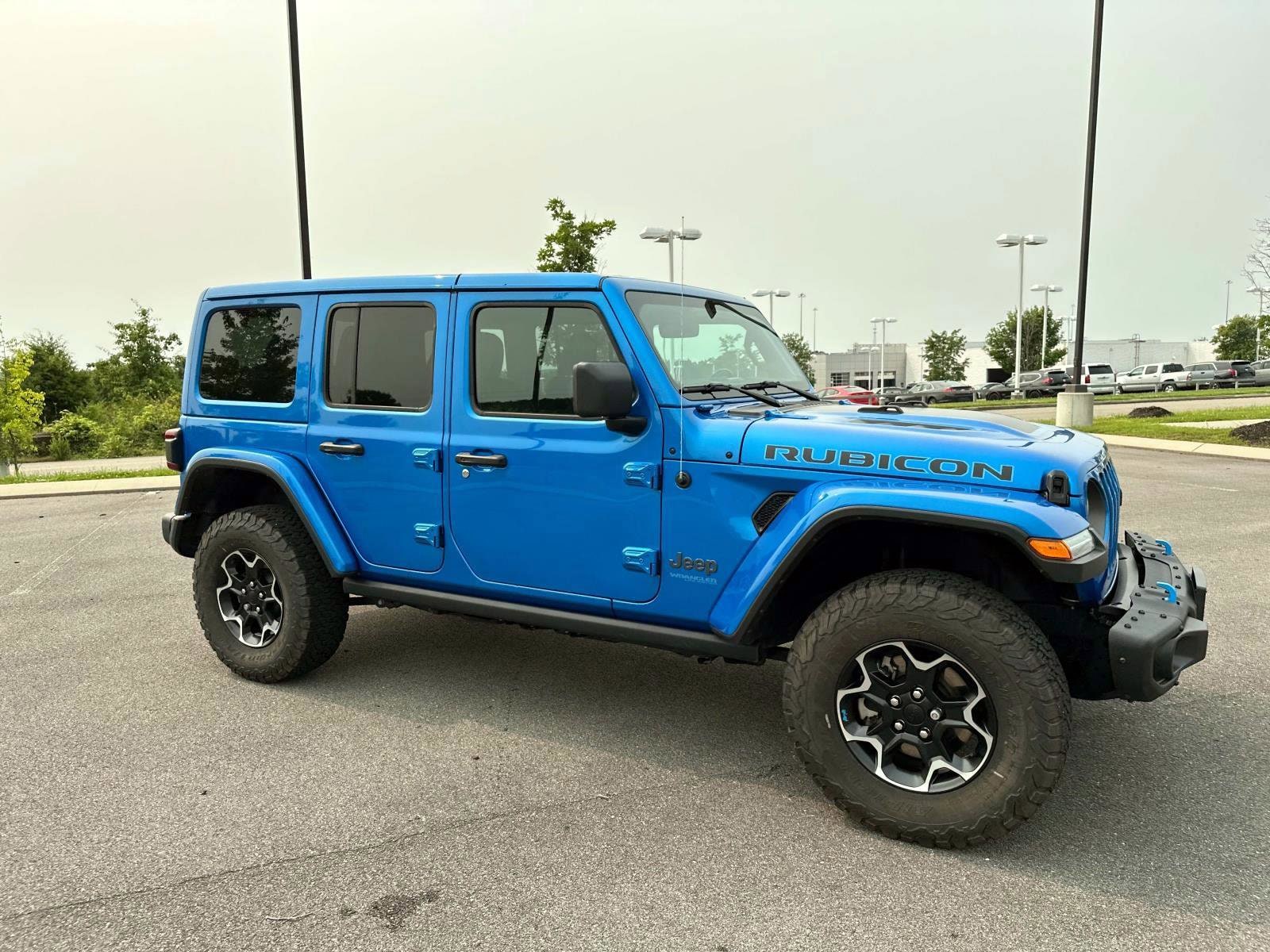 Used 2022 Jeep Wrangler Unlimited Rubicon 4XE with VIN 1C4JJXR67NW249384 for sale in Mcdonald, TN