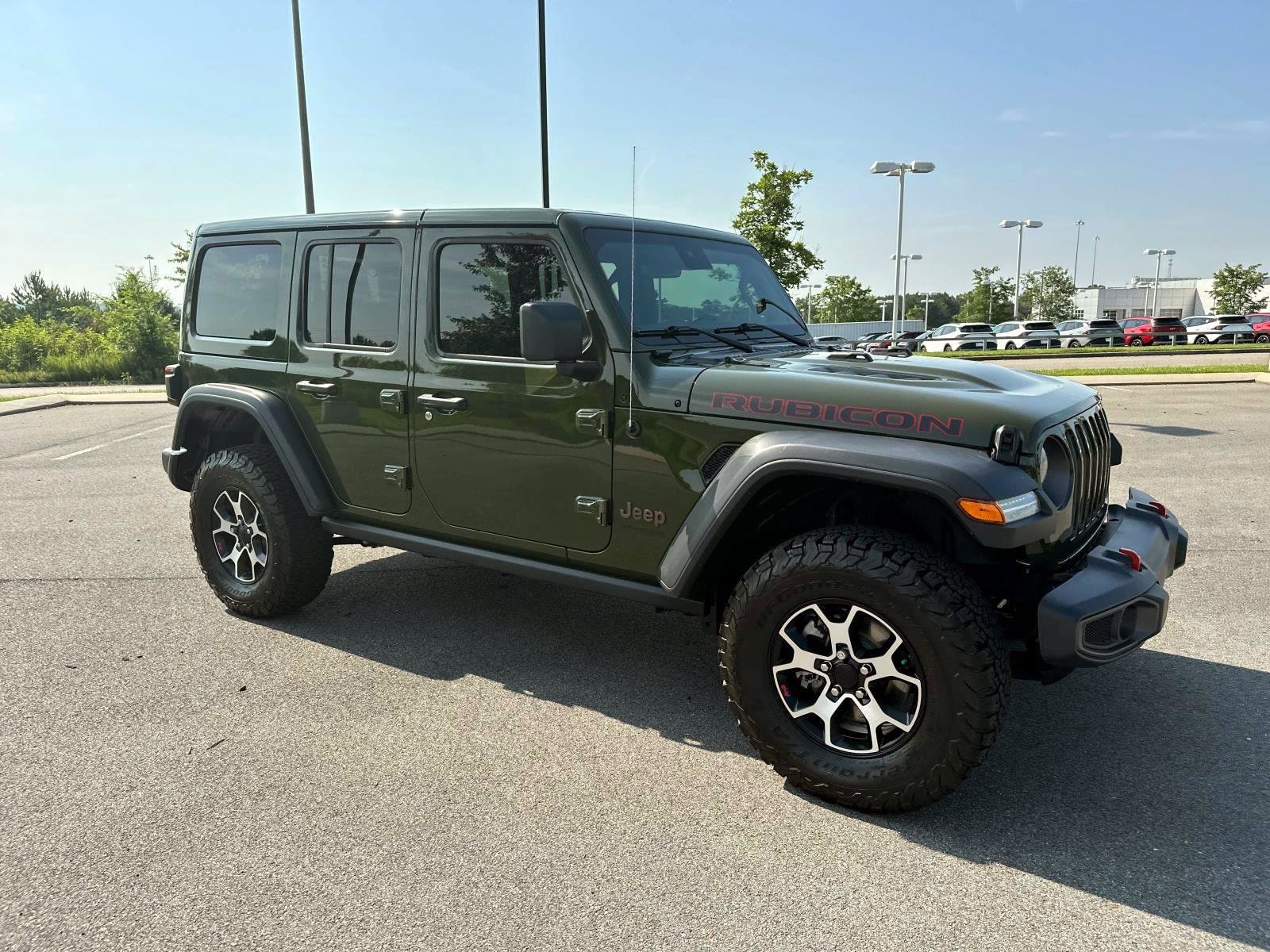 Used 2022 Jeep Wrangler Unlimited Rubicon with VIN 1C4JJXFMXNW238074 for sale in Mcdonald, TN