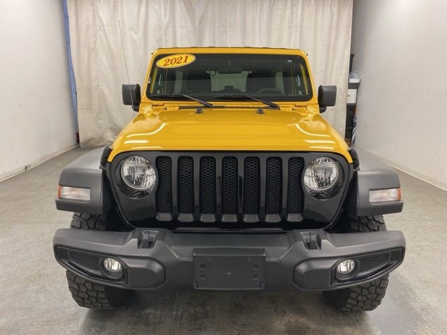 Used 2021 Jeep Wrangler Unlimited Willys Sport with VIN 1C4HJXDGXMW720800 for sale in Holland, MI