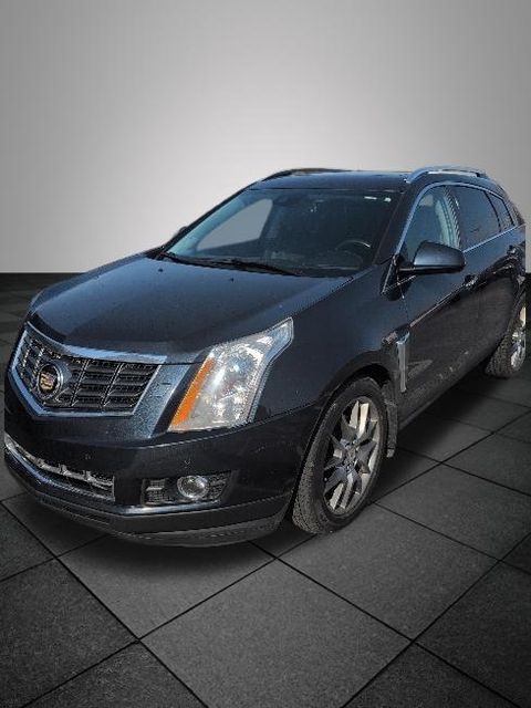 Used 2014 Cadillac SRX Premium Collection with VIN 3GYFNGE34ES542929 for sale in Holland, MI