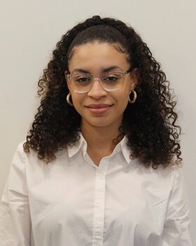 Staff member Mya Miller from 2f7c9fd39240