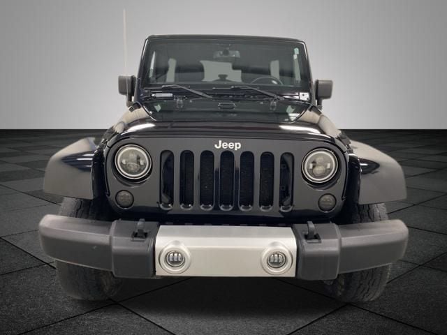 Used 2013 Jeep Wrangler Unlimited Sahara with VIN 1C4HJWEG1DL507597 for sale in Holland, MI