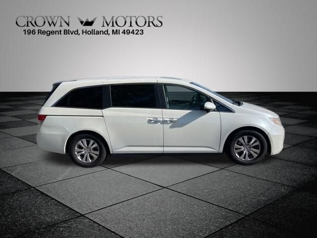 Used 2014 Honda Odyssey EX-L with VIN 5FNRL5H68EB075896 for sale in Holland, MI
