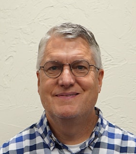 Staff member Eric Jensen from 4c683ce2aa81