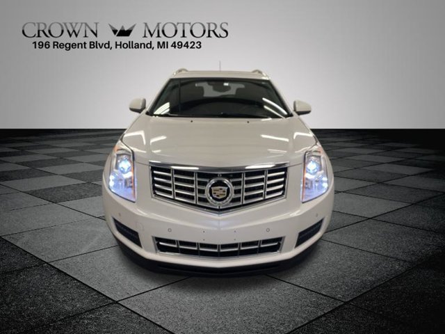 Used 2014 Cadillac SRX Luxury Collection with VIN 3GYFNEE38ES579762 for sale in Holland, MI