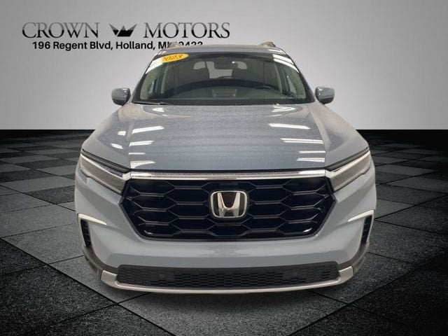 Certified 2023 Honda Pilot Touring with VIN 5FNYG1H73PB046083 for sale in Holland, MI