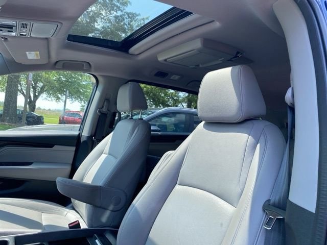 Certified 2023 Honda Odyssey Touring with VIN 5FNRL6H88PB030497 for sale in Holland, MI