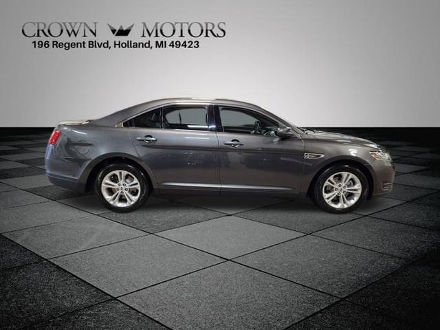 Used 2018 Ford Taurus SEL with VIN 1FAHP2E83JG111651 for sale in Holland, MI