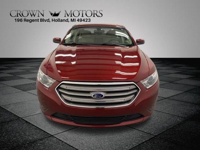 Used 2013 Ford Taurus SEL with VIN 1FAHP2E80DG112759 for sale in Holland, MI