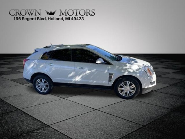 Used 2014 Cadillac SRX Luxury Collection with VIN 3GYFNEE38ES579762 for sale in Holland, MI