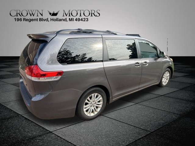 Used 2011 Toyota Sienna XLE with VIN 5TDYK3DC7BS166714 for sale in Holland, MI