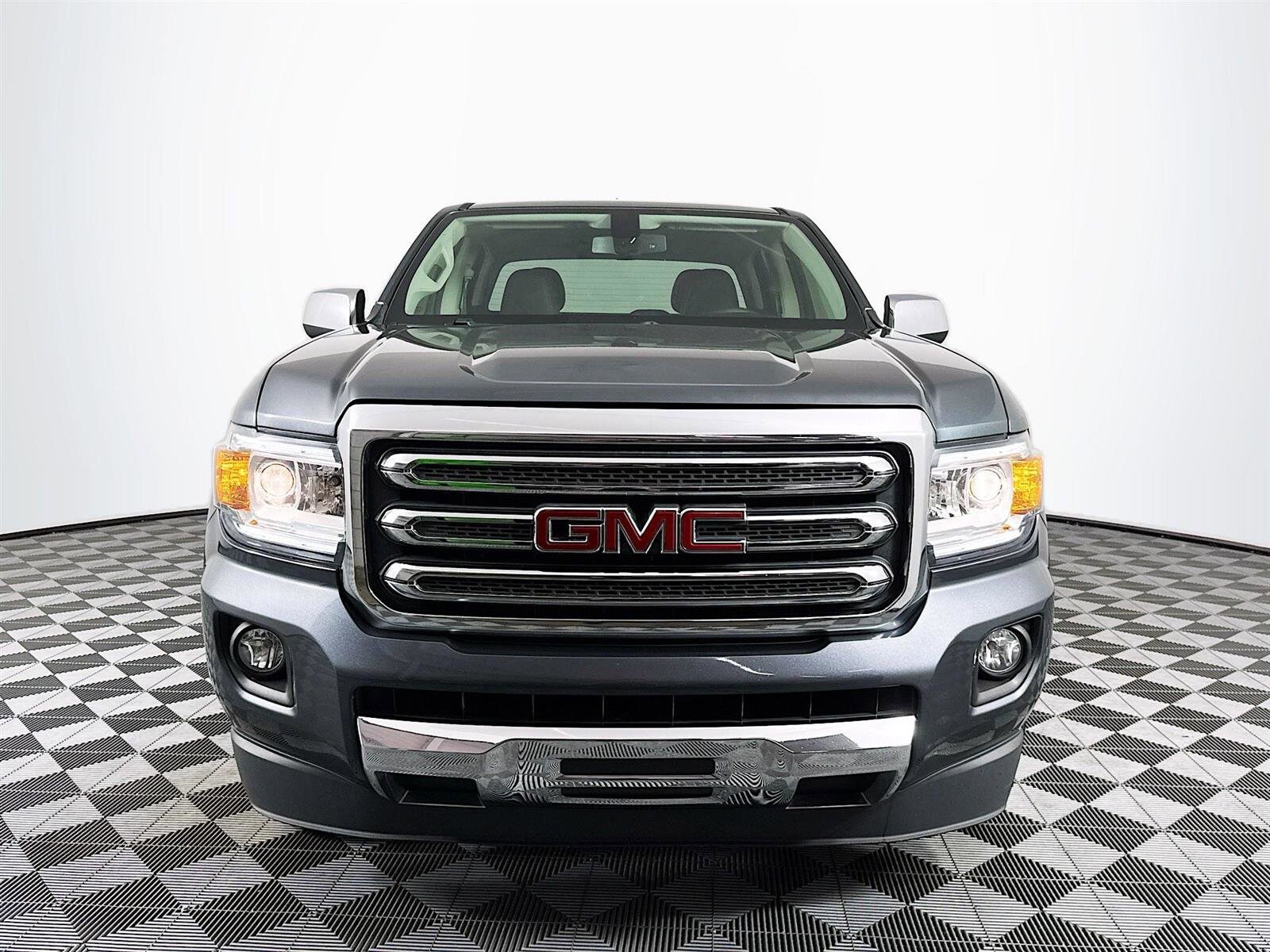 Used 2015 GMC Canyon SLT with VIN 1GTG5CE30F1263693 for sale in Saint Petersburg, FL