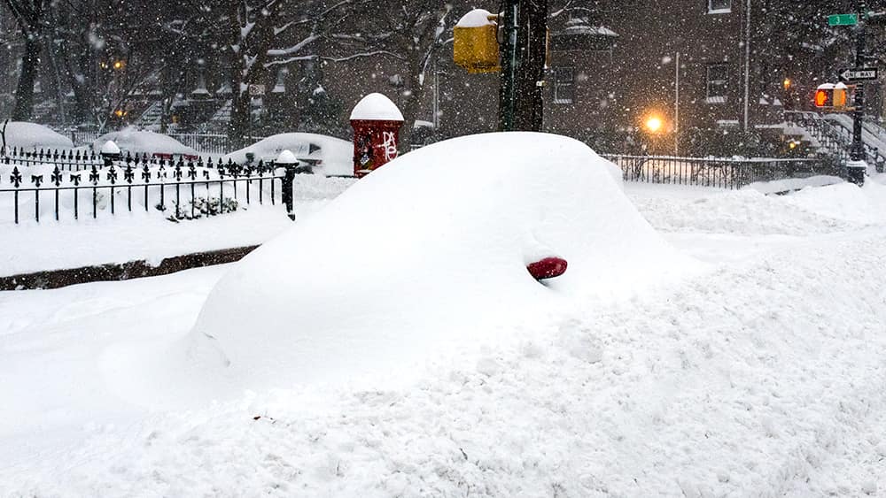 car-under-snow.jpeg