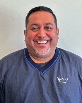 Staff member Gregory Velez from ID_73b363e81b90