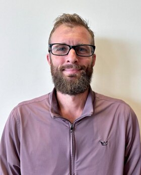 Staff member Ethan Elhart from ID_73b363e81b90