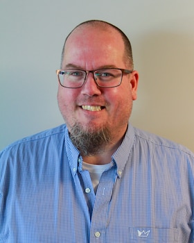 Staff member Jason Holland from ID_fe61812bb494