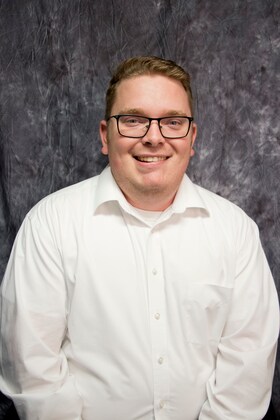 Staff member Kyle Smith from ID_2932b9151ba7