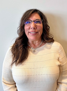 Staff member Caryn De La Rosa from ef83d6073382
