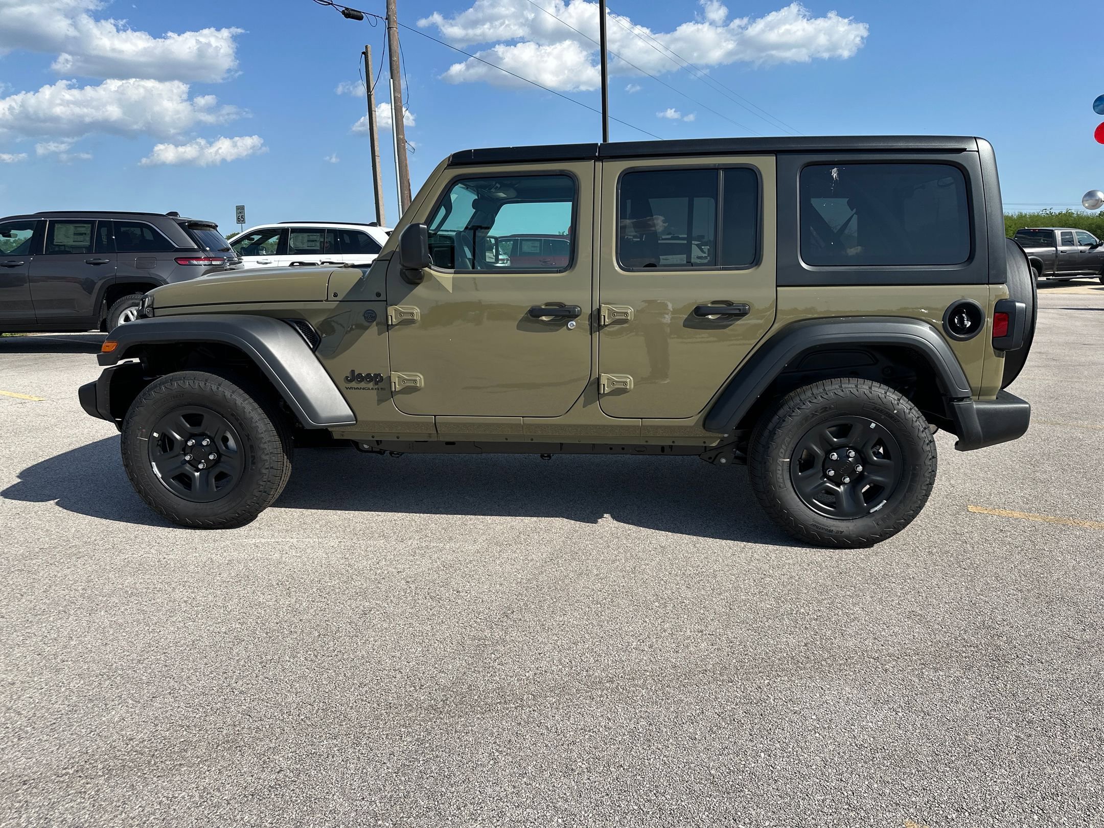 2025 Jeep Wrangler Sport photo 2
