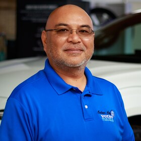 Staff member Charlie Lagua from bd13c5108b58