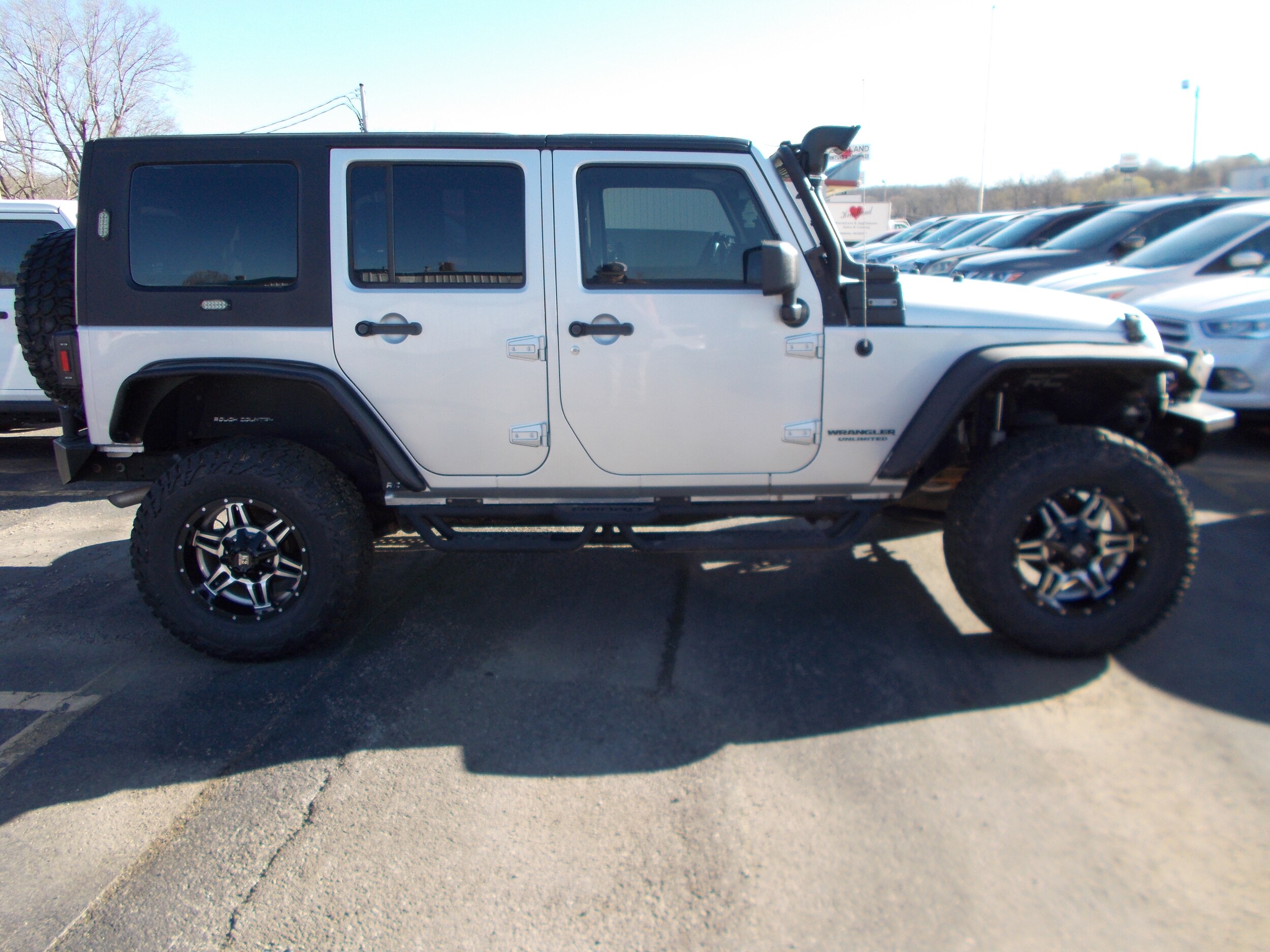 Used 2009 Jeep Wrangler Unlimited X with VIN 1J4GA39119L760825 for sale in Doniphan, MO
