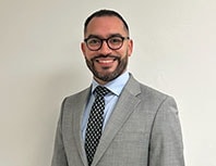 Staff member Angelo DeLeon from ID_7cd44a45d049