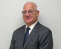 Staff member John Mazzeo from ID_e0c1fb7a9cbc