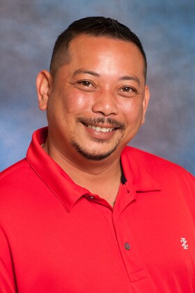 Staff member Joseph Manguba from ID_ab643e