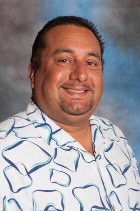 Staff member Ernie Salazar from ID_ab643e