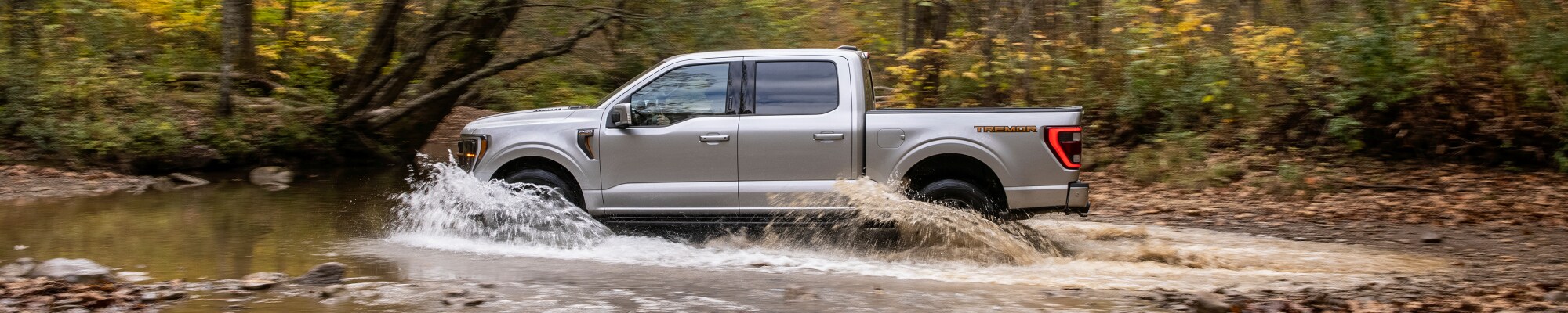New Ford F-150 driving through water