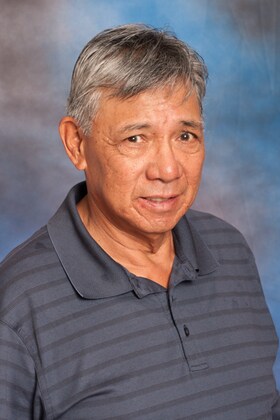 Staff member Rey Suenaga from d09af0151077