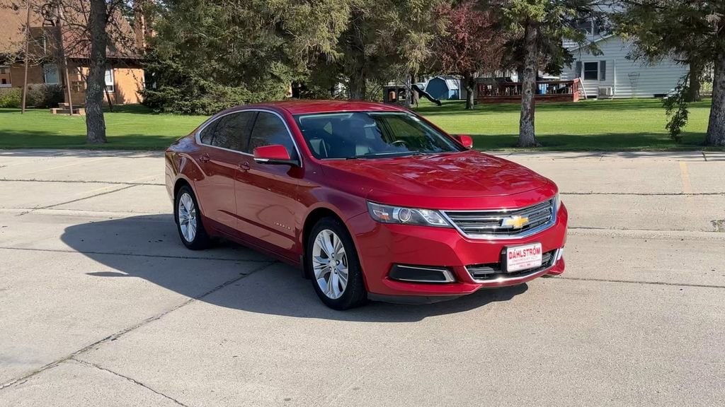 Used 2014 Chevrolet Impala 1LT with VIN 1G1115SL7EU101003 for sale in Oslo, Minnesota