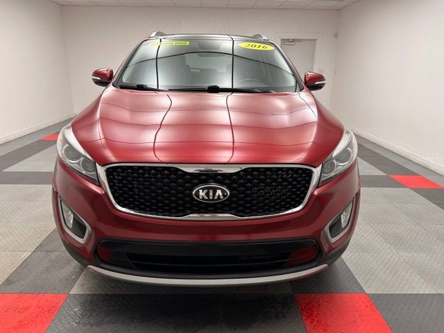 Used 2016 Kia Sorento EX with VIN 5XYPHDA16GG125711 for sale in Kansas City