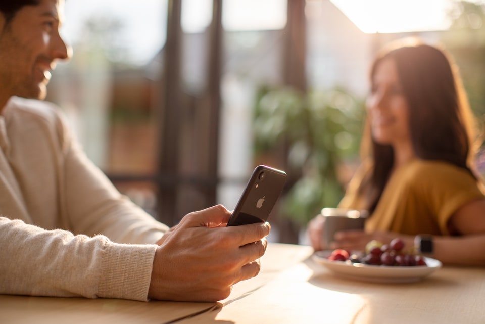  Couple at the table enjoying breakfast