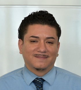 Staff member Ernesto Rivera from ID_612c5a0138f8
