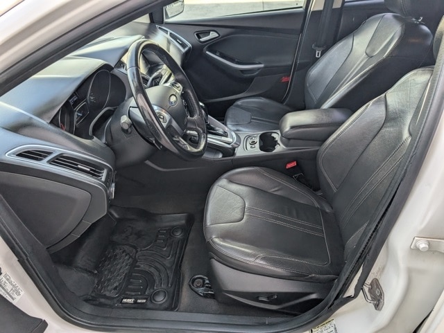 Used 2013 Ford Focus Titanium with VIN 1FADP3J28DL116913 for sale in Waterloo, IA