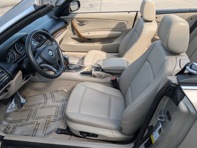 Used 2010 BMW 1 Series 128i with VIN WBAUL7C57AVJ77588 for sale in Waterloo, IA