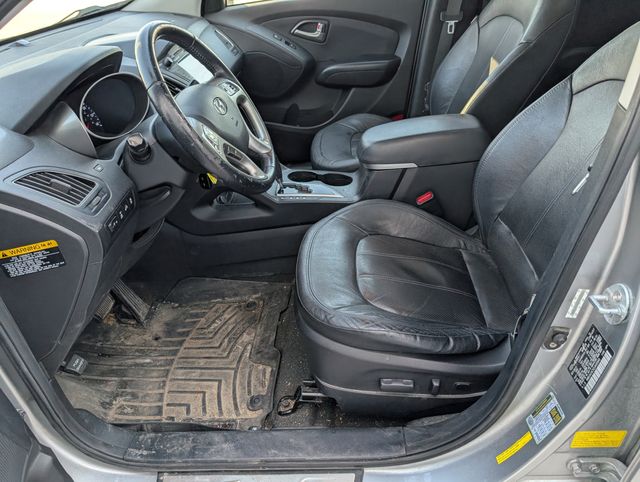 Used 2012 Hyundai Tucson Limited with VIN KM8JUCAC5CU405945 for sale in Waterloo, IA