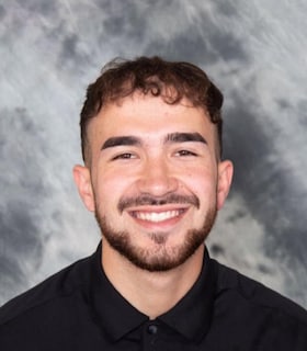 Staff member Zach James from ID_8cc1f6c7e1c6
