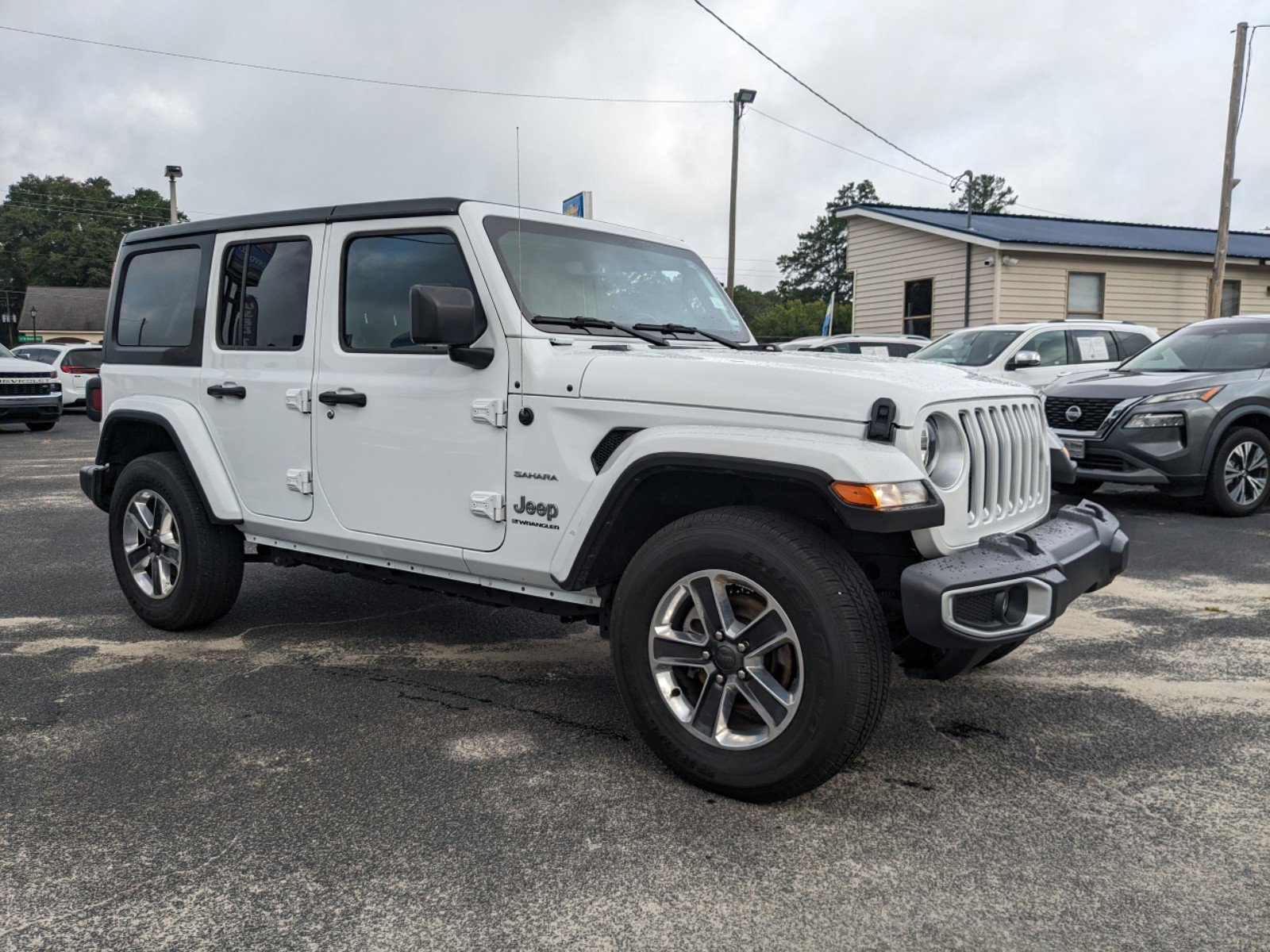 Used 2023 Jeep Wrangler 4-Door Sahara with VIN 1C4HJXENXPW562864 for sale in Metter, GA