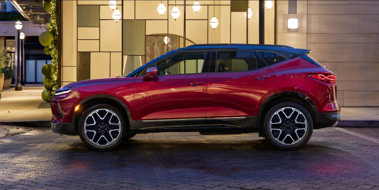 a-red-2023-chevy-blazer-parked-on-a-city-street.PNG
