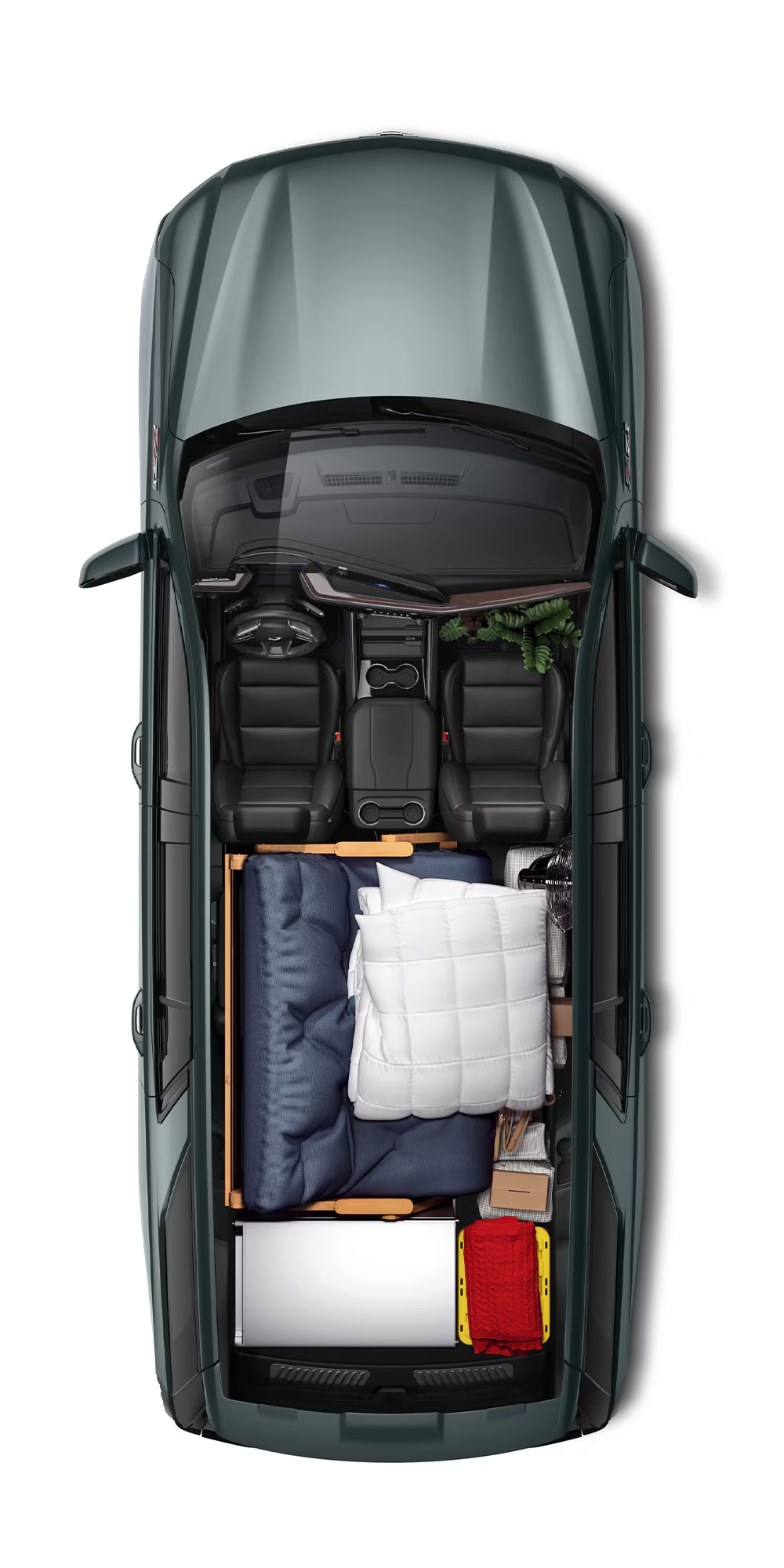 Overhead cutaway of a Chevy Tahoe with rear seats folded flat holding a mattress, bedding, and gear