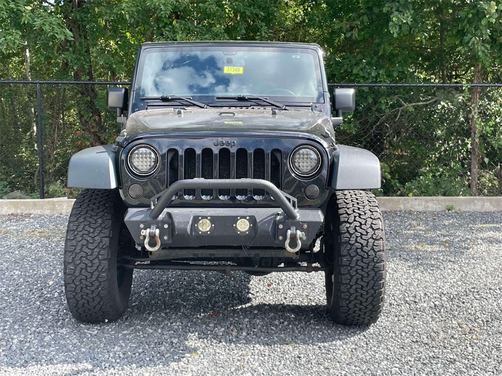Used 2016 Jeep Wrangler Unlimited Willys Wheeler with VIN 1C4HJWDG5GL277908 for sale in Westport, CT