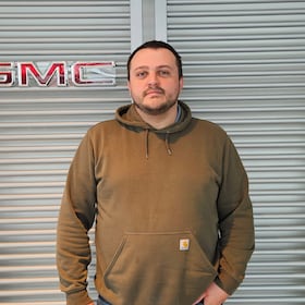 Staff member Elijah Maverick from a4701f91d683