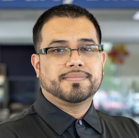 Staff member John Cardoza from ID_a5e84ee88b91