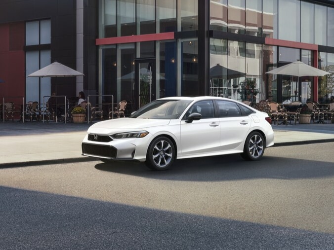 2026-Honda-Civic-SportTouringHybrid-Sedan-L01-676x507.jpg