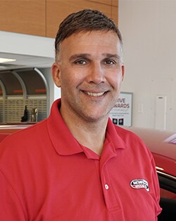 Staff member Gary Estrella from ID_aa08519ba128