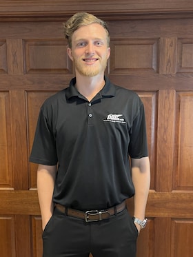 Staff member Caleb Fortener from 204954546ae5