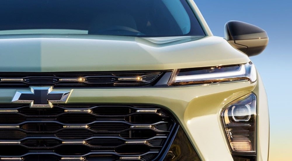 A close up shows the front of a green 2024 Chevy Trax for sale near Columbus.
